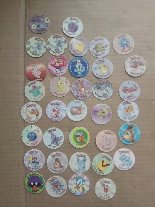 Продавам Покемон карти за игра , фигурка , тазота,Lapras Aqua
