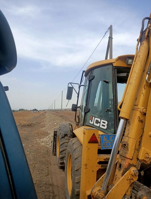 Экскаватор погрузчик трактор Талгар