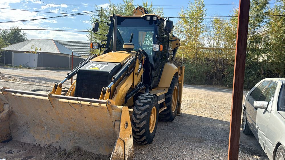 ЭкскаваторПагрузчикCAT