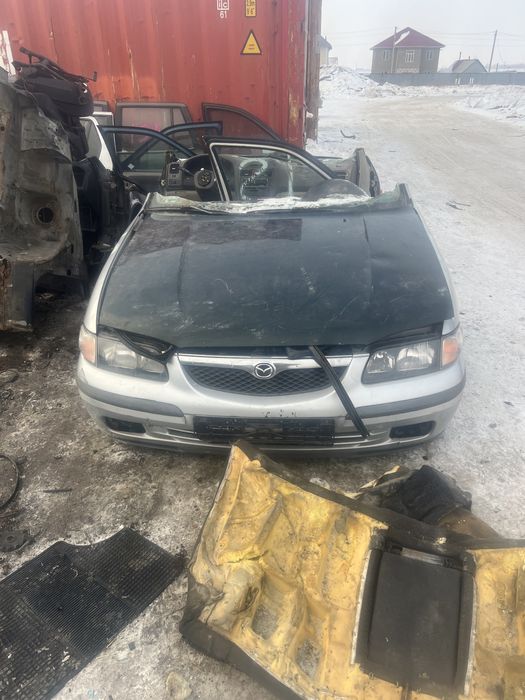 Мазда 626 птичка