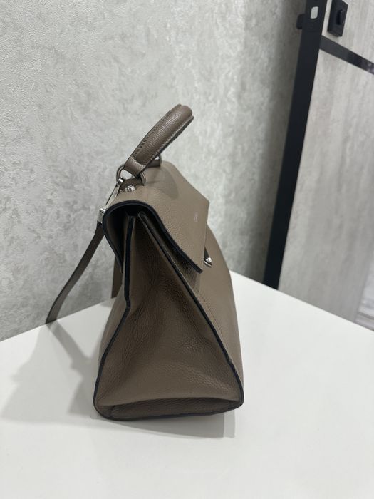 Сумка таза кожа