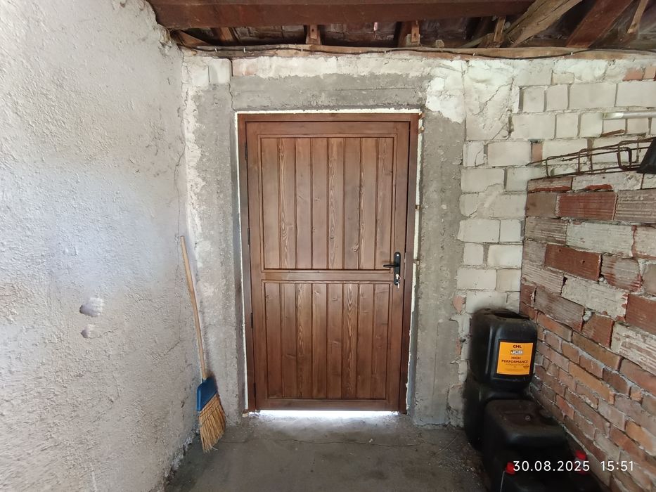 Изработка на дървени порти и гаражни врати