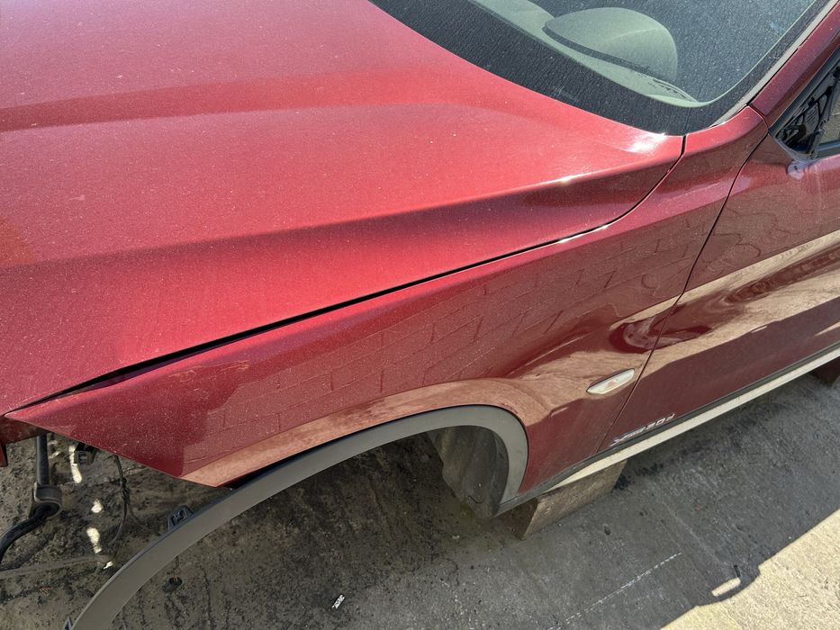 Aripa dreapta bmw X1 e84 an 2010 culoare vermilion rot metallic