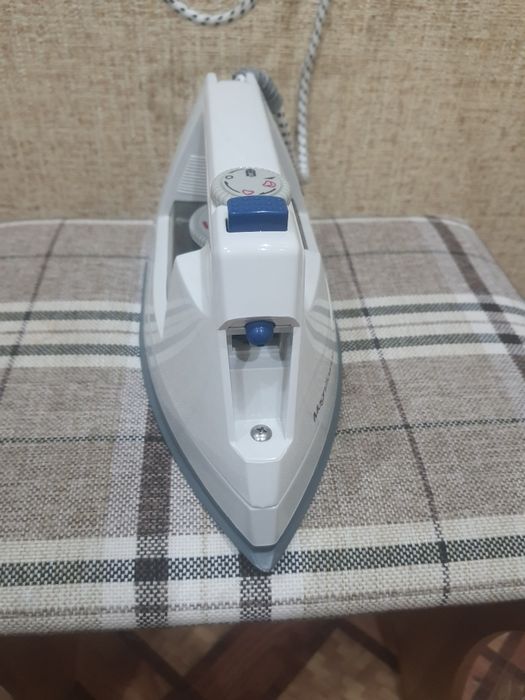 Утюг новый rising