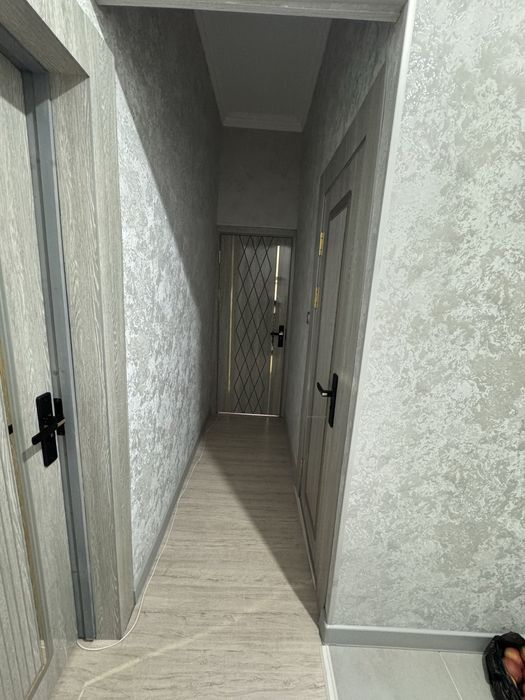 Бирхоналик ва икки хоналик бирта килинган общий площад 107 кв метр