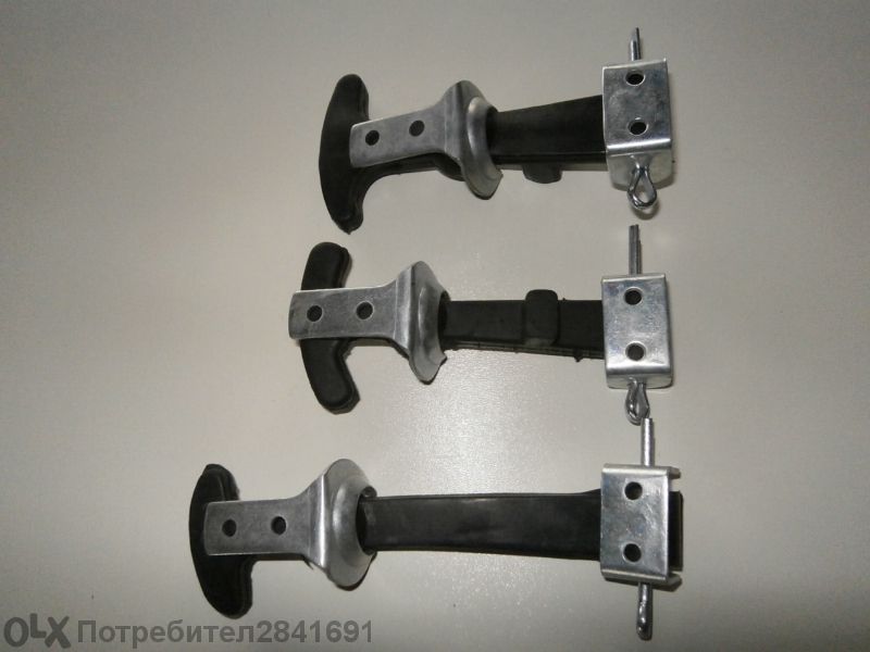 Гумени / ластични, каучукови / ключалки за капаци на машини.