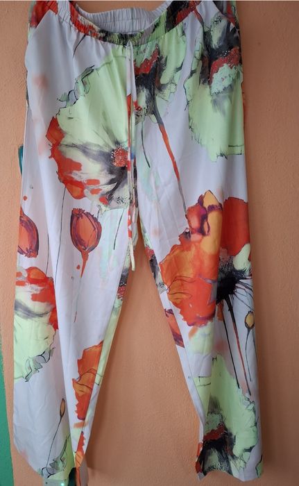 Compleuri cu pantaloni de dama