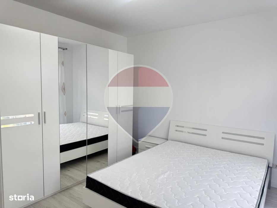 Inchiriere Apartament cu 2 camere, grădină de 62 mp și parcare
