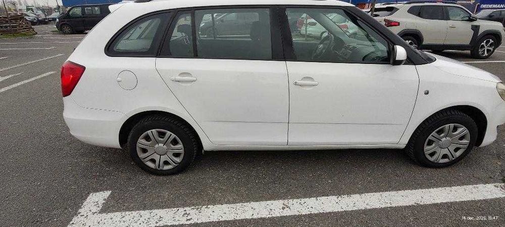 Skoda Fabia Combi, an 2013, motor 1.6 TDI CAYA (75 CP, Euro 5)