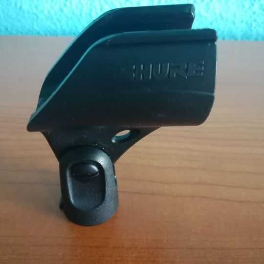 Suport nuca clema SHURE pentru microfon , realizat din ABS rezistent.