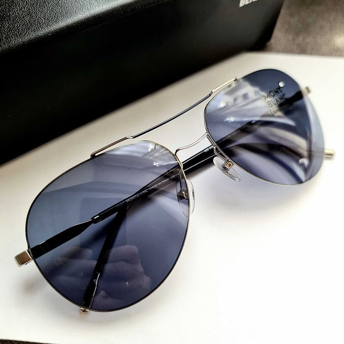 Солнцезащитные очки.