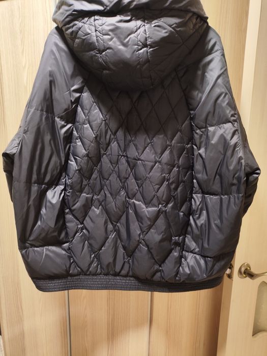 Пуховик женский .