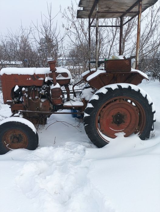 Продам трактор Вместе с телегой, с запчастями