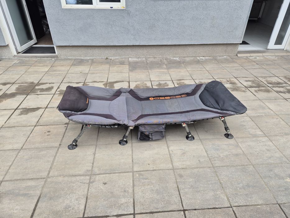 Vând pat pescuit pliant model xxl calitativ . Schimb  cu jante bmw