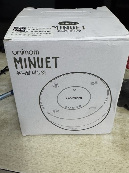 Молокоотсос unimom minuet