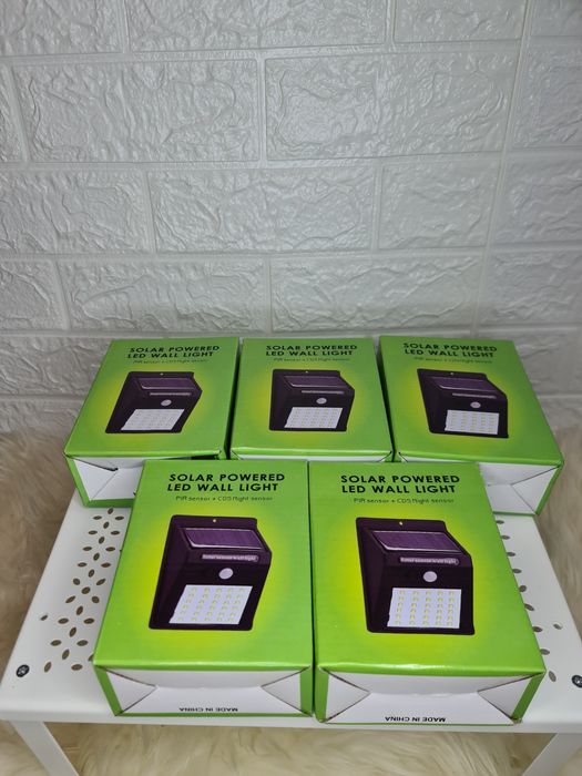 100lei Livrare GRATUITA set 4 lămpi solare perete/gard