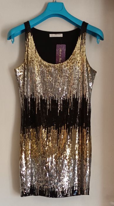 Официални блестящи рокли с лоторки сребристи златисти и черни цветове.