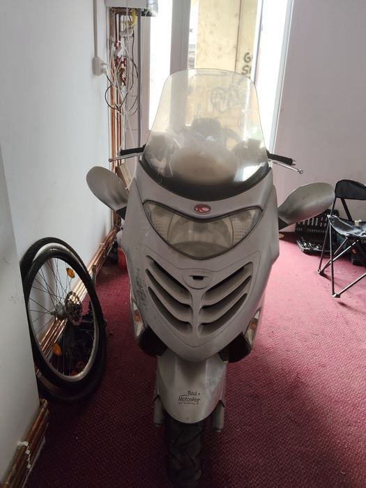 Vând scuter de 125 kymco