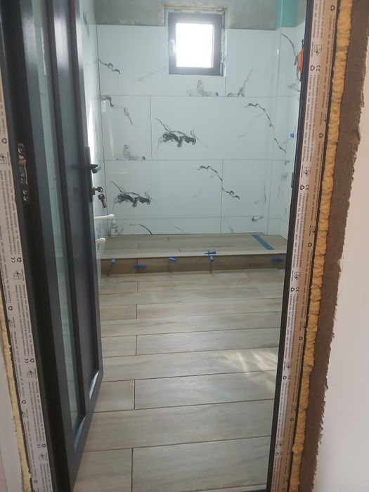 Zugrav gresie faianta  rigips parchet totul  pentru o casa la gata .