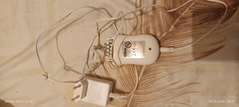 Epilator Philips și Qlive negru și alb
