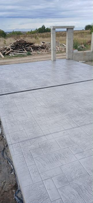 Pardoseli din beton amprentat/elicopterizat(120 ron/mp)