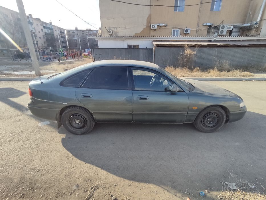 Продаёт Мазда Кронос 1996 года