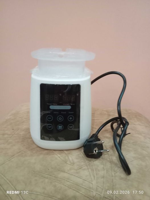 Уред за бебешки шишета.