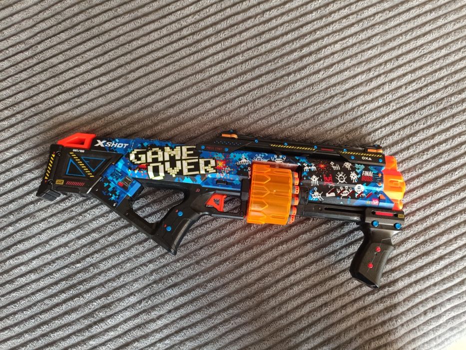 X Shot SKINS Last Stand 60см. - Мега бластер с барабан с  меки стрели