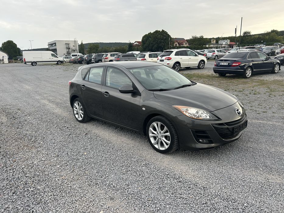 Mazda 3 1,6 benzina 105 cp 2010
