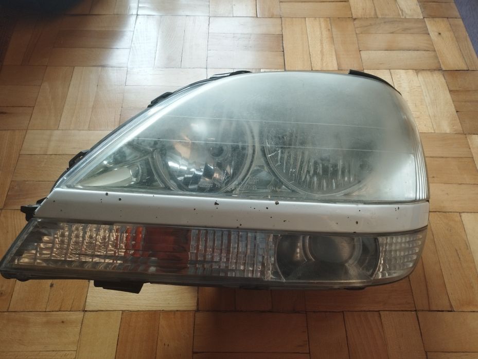 Оригинальная ксеоновая фара левая Lexus RX300