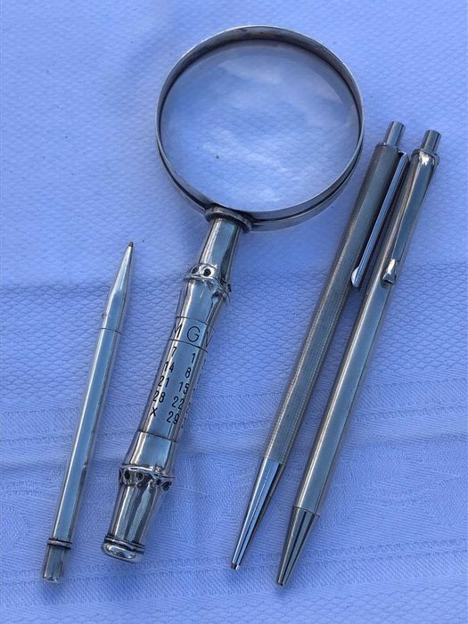 Lupa si pixuri de argint