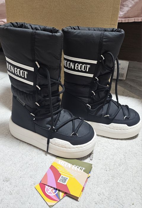Нови Moon Boot 32