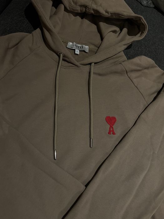 LOEWE , Ami Paris-пуловери