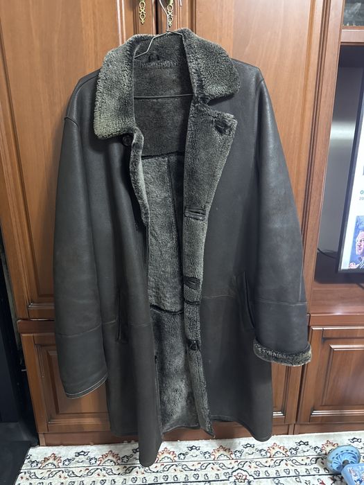 Коричневая дубленка