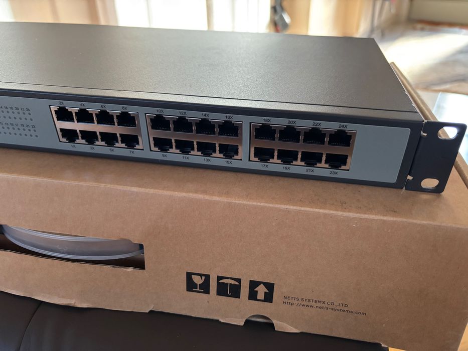 Ethernet Switch ST3124 Netis 24 Porturi 10/100Mbps Montabil in Rack