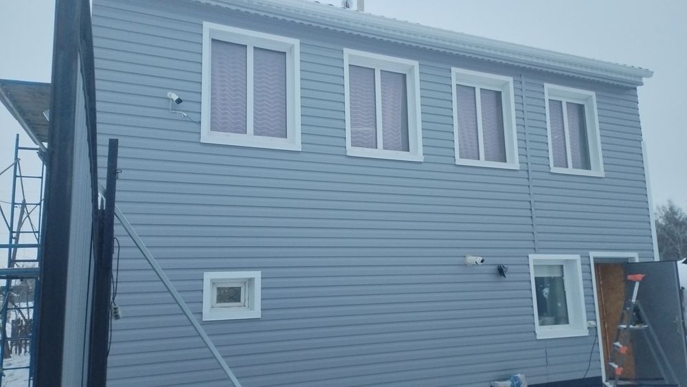 Обшивка фасада сайдингом, профлистом