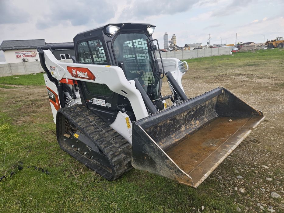 Închiriere Buldoexcavator Caterpillar 428 | Servicii Profesionale/ Parcuri  fotovoltaice