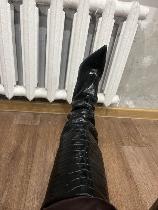 Продам новые сапоги