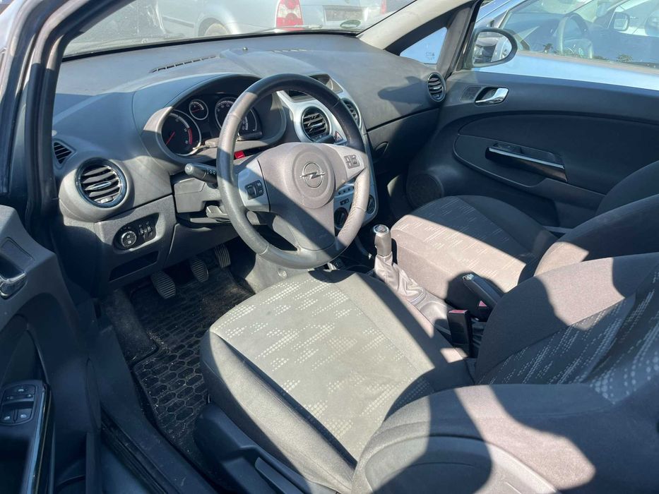 Dezmembrez Opel Corsa D facelift 2011 coupe 1,3 diesel EcoFlex gri Z179
