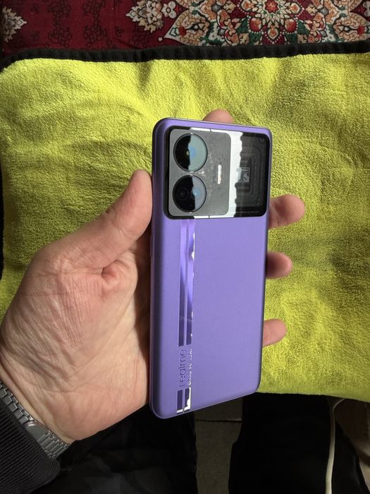 Realmi gt neo5 16.1T hotira holati ideal oqip tel qlila