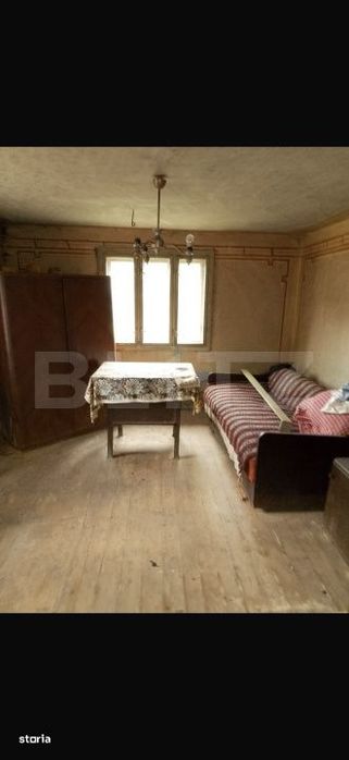 Casa cu 3 camere si un teren de 3000 mp, zona Cuzaplac
