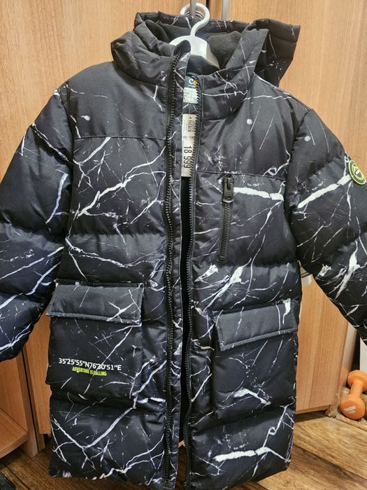 Продам зимнюю куртку для мальчика.