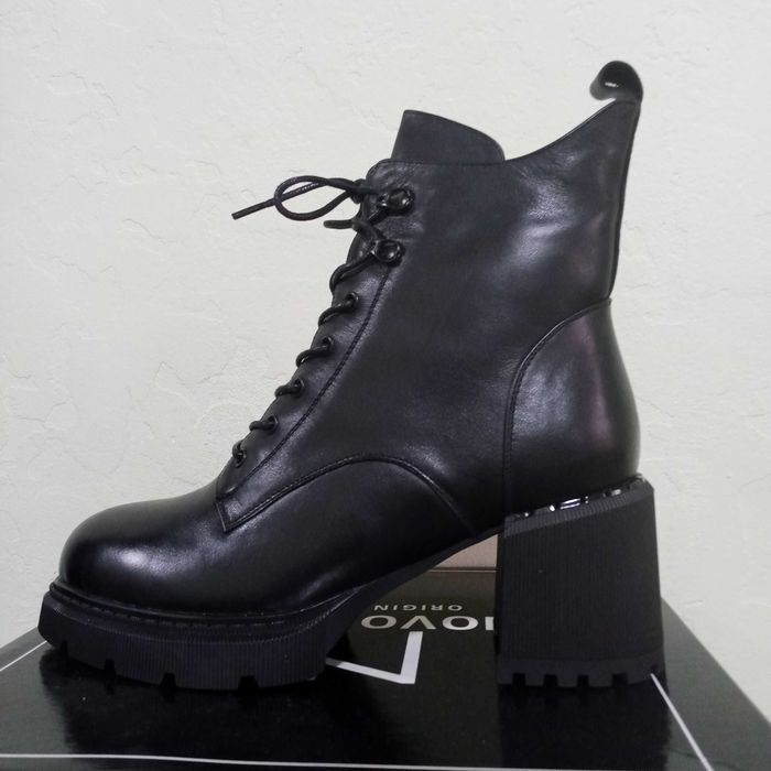 Новые женские сапоги