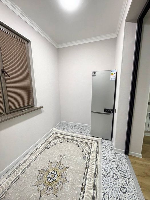 Яшнабад улица Иззат Новостройке продается квартира 2/2/8  56м2