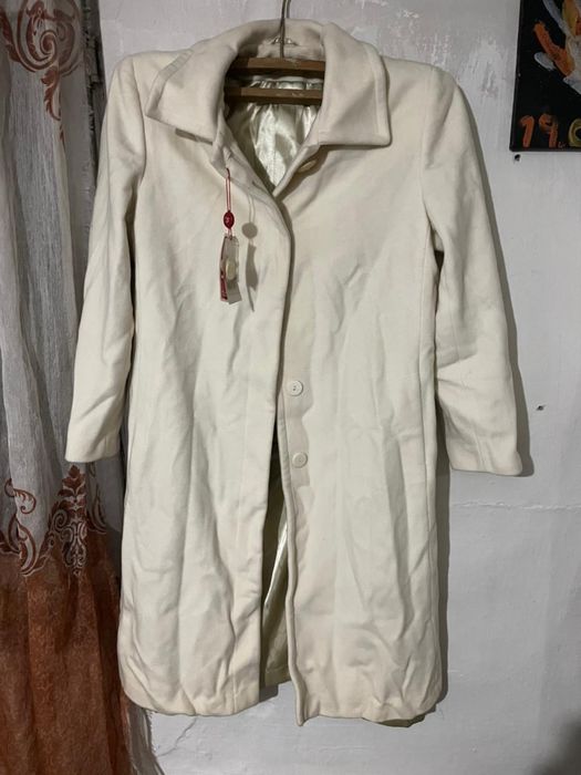 Новый пальто до колени