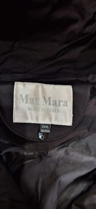 Продаю пуховик женский