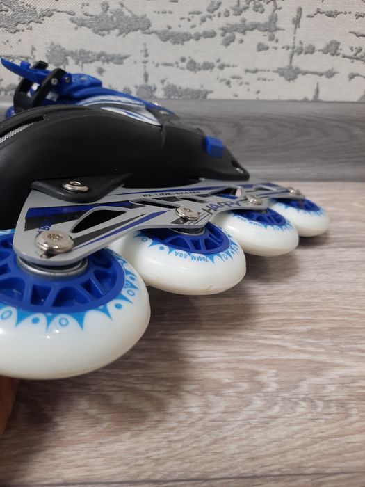 Роликовые коньки