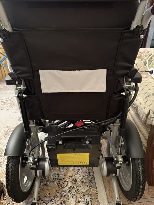 Электрическая  инвалидная коляска