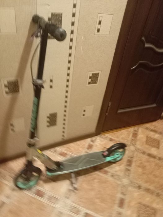 Продам самокат с большими колесами в отличном состоянии