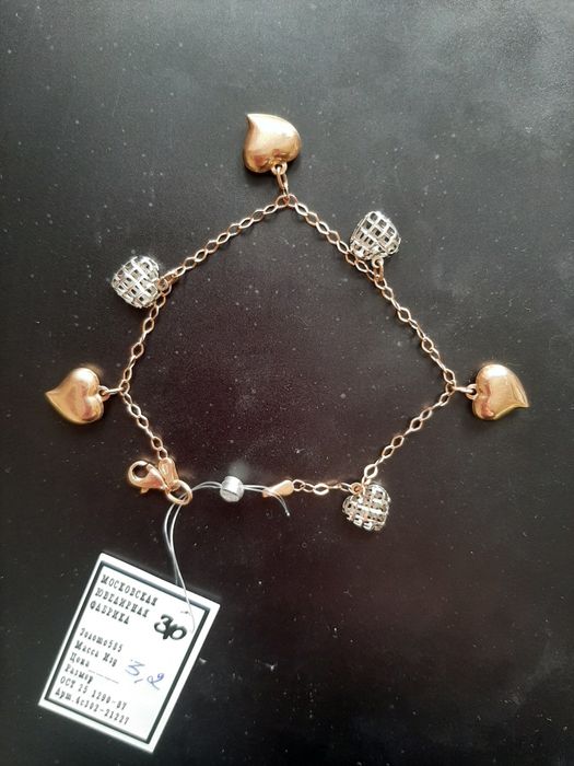 Продам золотые серьги